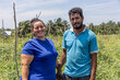Farming couple in Cayo Belize in a field