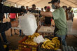 A man hands out boxes of ready-to-eat food at a shelter for earthquake survivors in Venezuela. Photo: WFP/Gustavo Vera