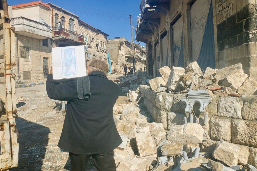 Within hours after the earthquakes, WFP delivered food assistance to thousands of people, including this man, in Syria's Idlib Governorate. Photo: WFP/Lina Alqassab