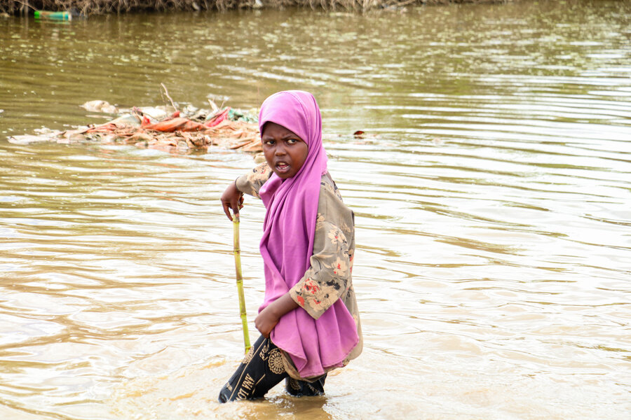 A child wading through water